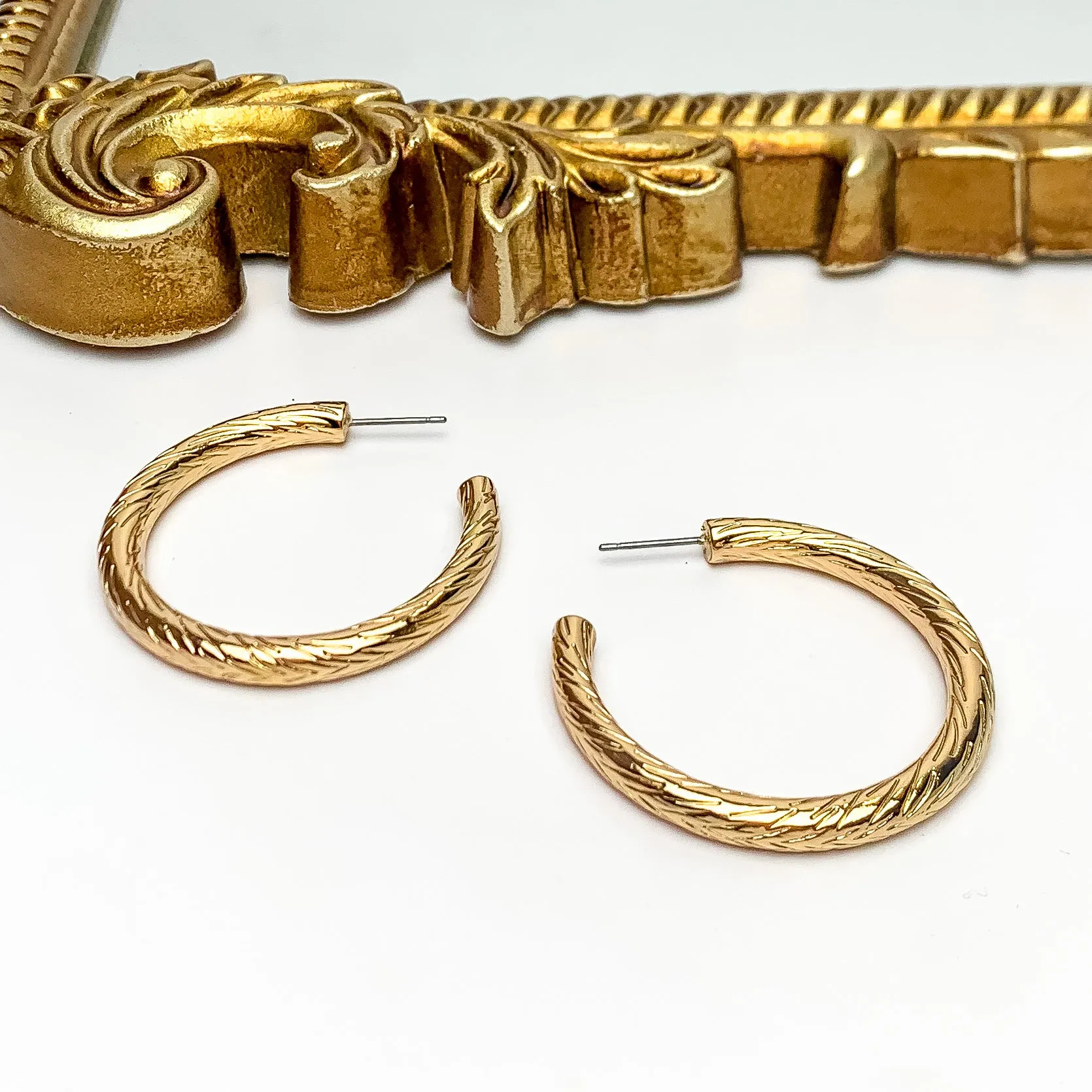 Gold Tone Large Twisted Hoop Earrings