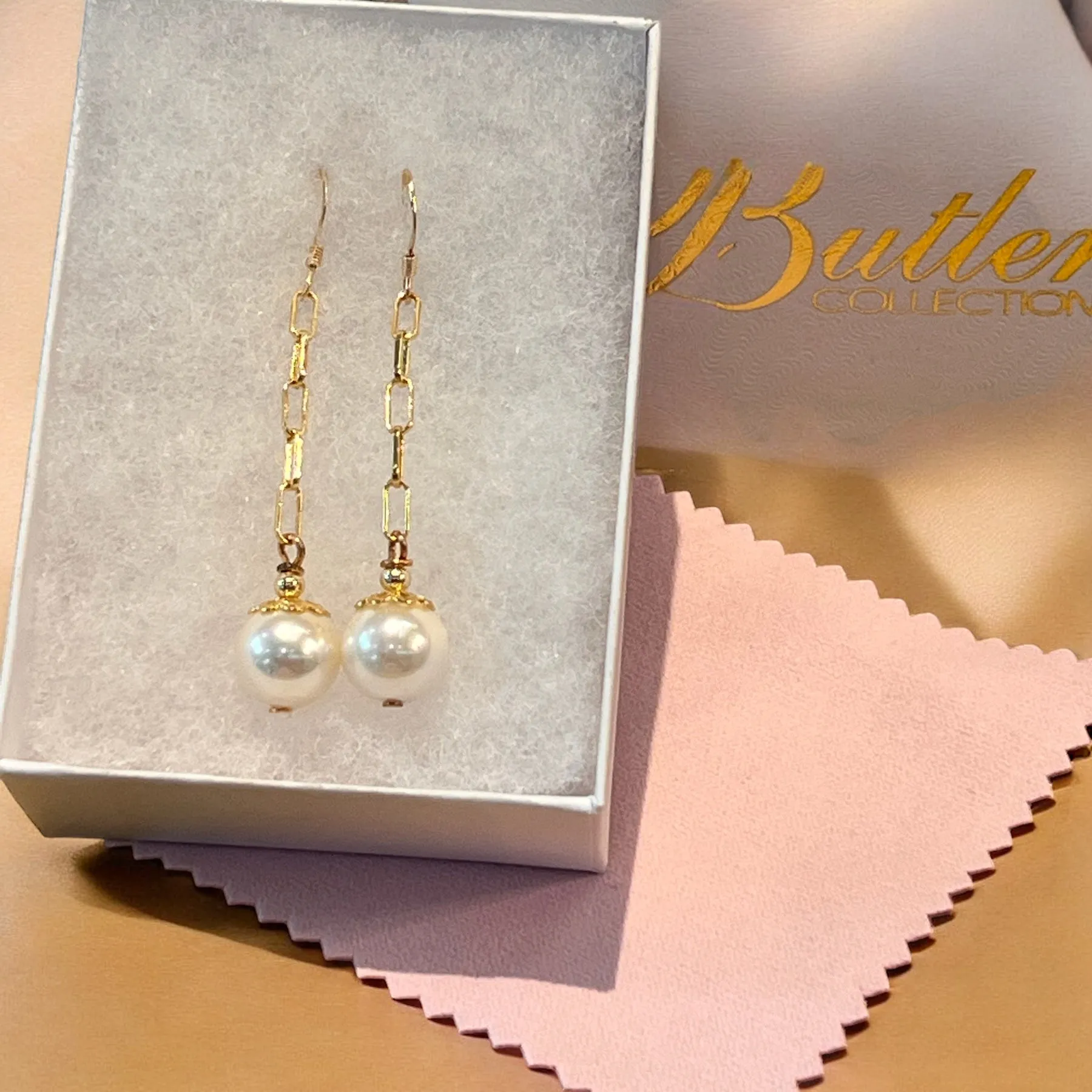 Long White Pearl Earrings in Gold