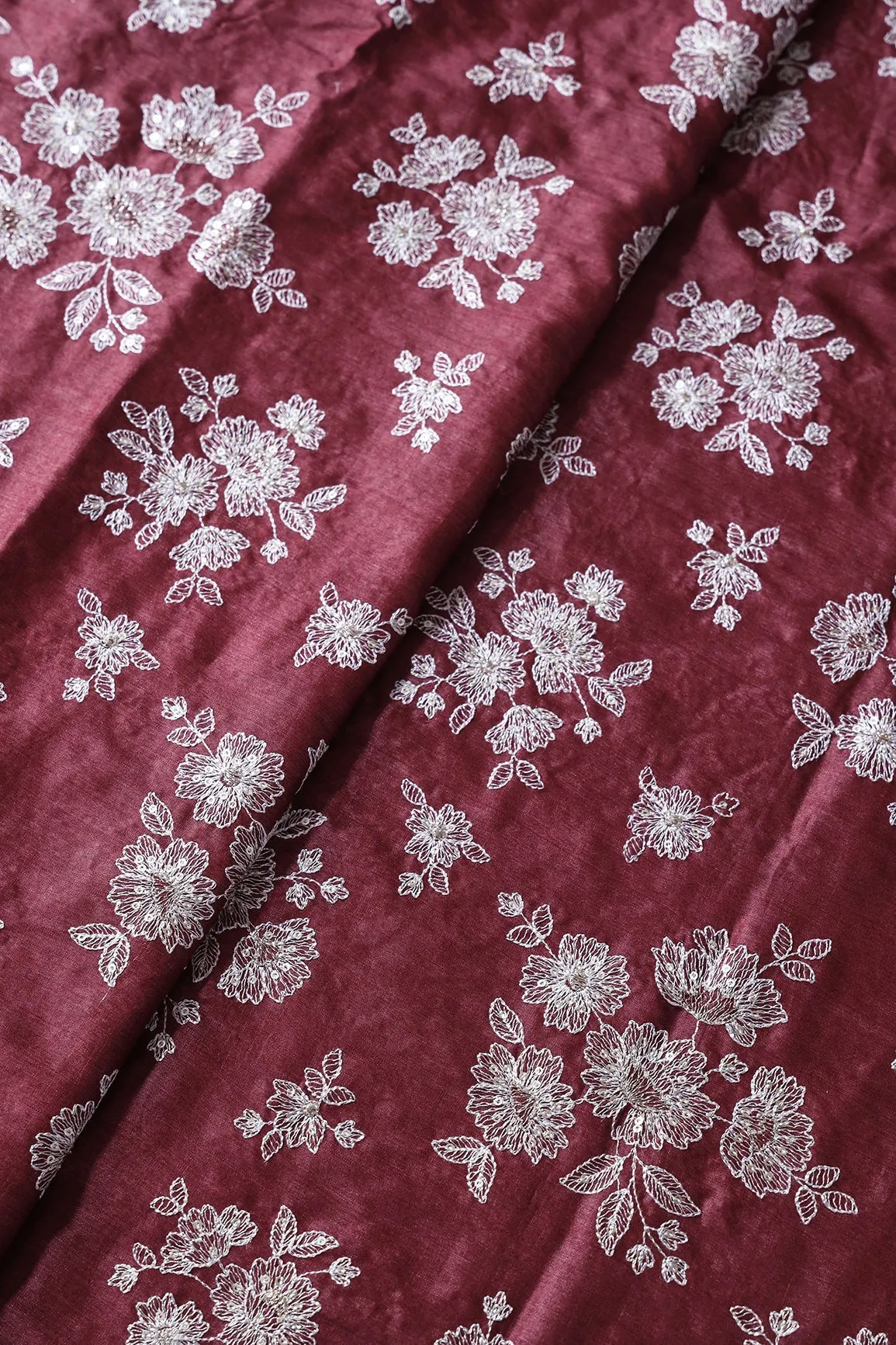 White Thread With Gold Sequins Floral Embroidery On Maroon Pure Bamboo Silk Fabric