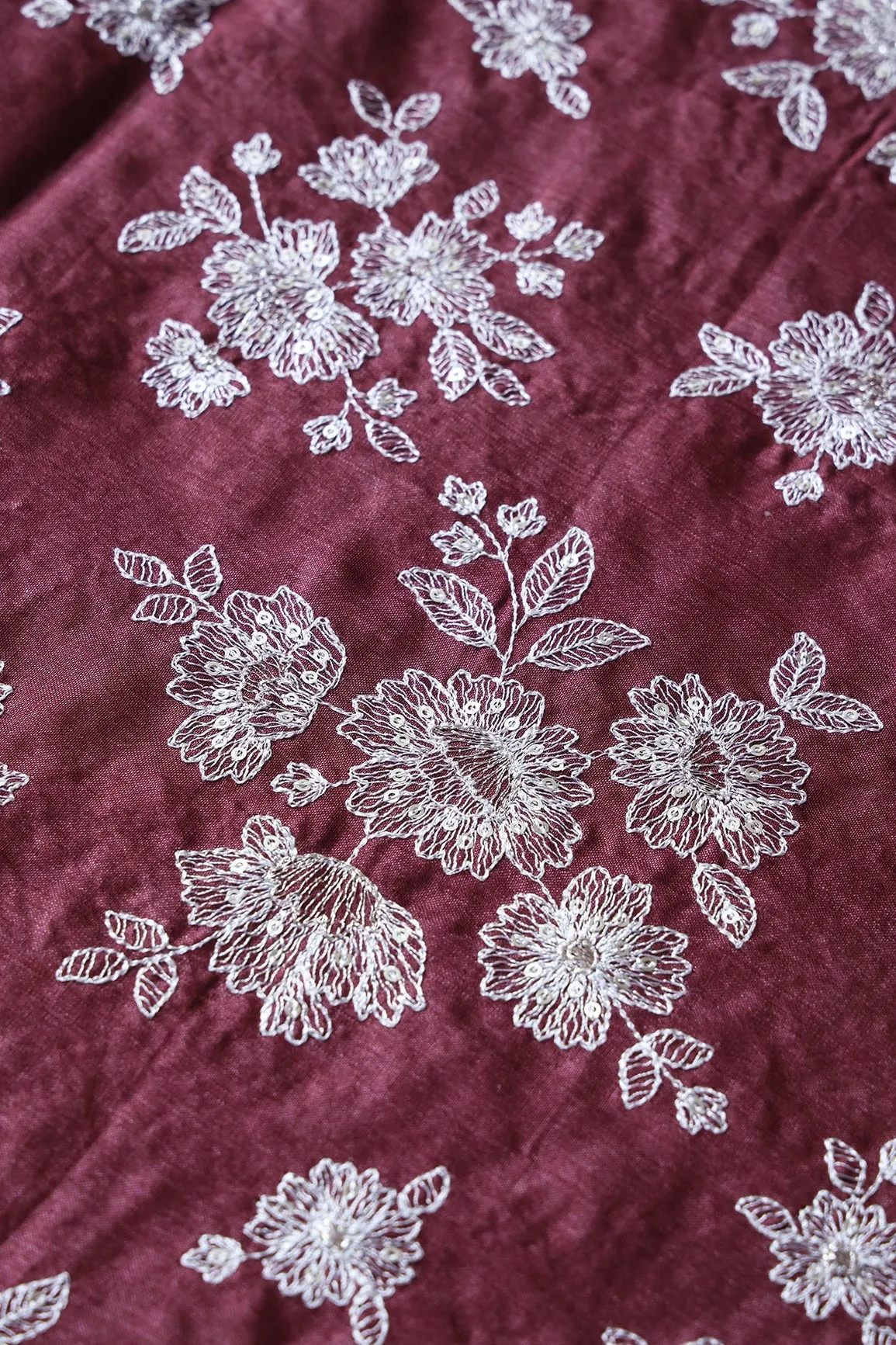 White Thread With Gold Sequins Floral Embroidery On Maroon Pure Bamboo Silk Fabric